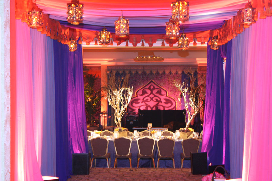 ballroom entrance drape and lamp treatment with scalloping.jpg