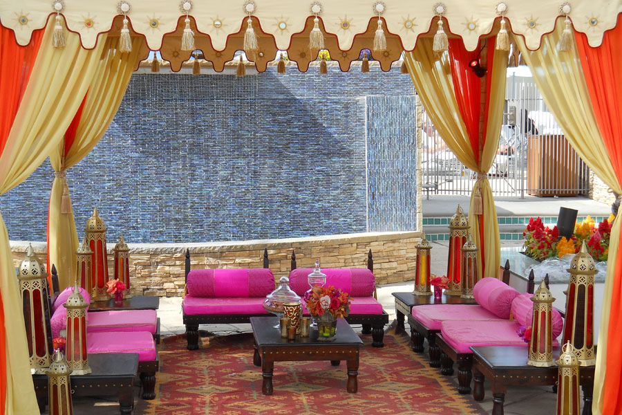 Raj Tents Honey glow pergola with hot pink lounge.jpg