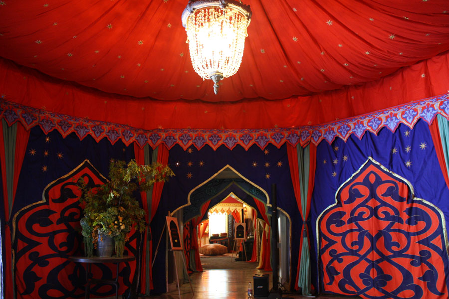 custom canopy in red with gold star and moorish arch walls.jpg