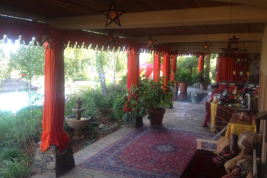 Raj Tents Home Decor themed treatment -Logia decor with draped pillars and scalloping Moroccan theme.jpg