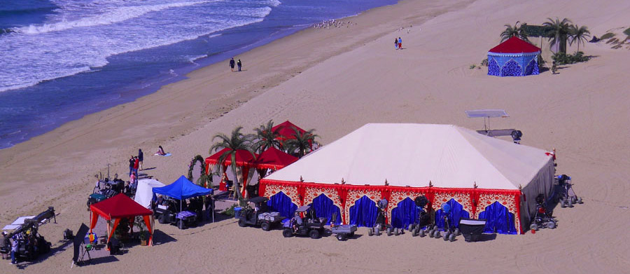 Frame tent outsourced beach stage set.jpg