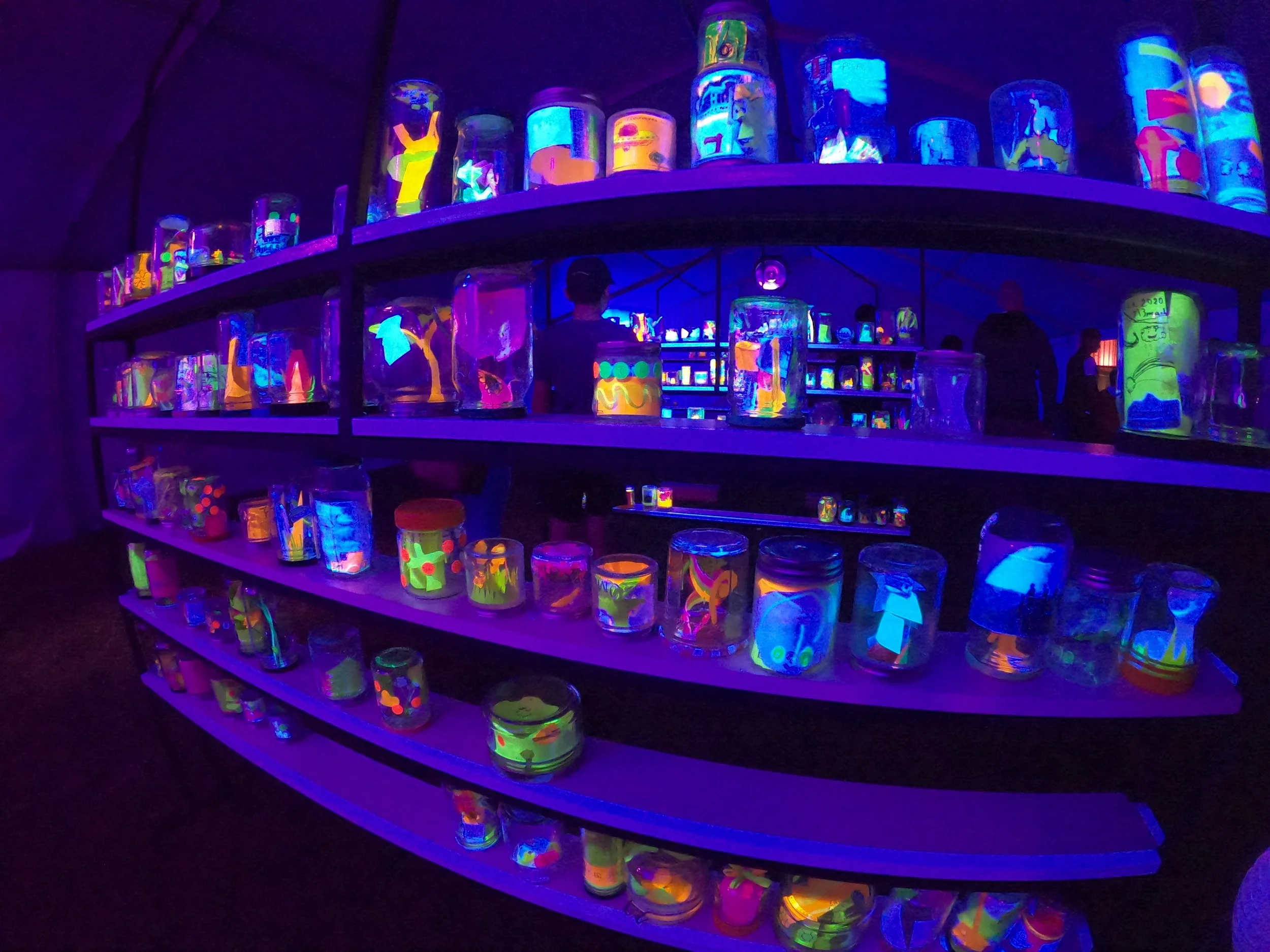  Through a series of community workshops, artist Alex Stalling invited young people to consider the future of Toowoomba for LIT Festival 2020. Participants created miniature art works to share their dreams for the future. Activated by blue light the 