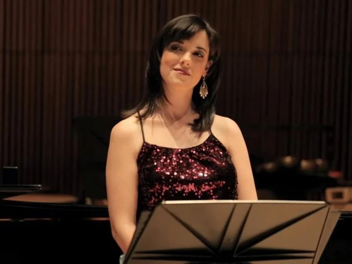 The premiere of Jonathan Katz' s Meachem Songs . 