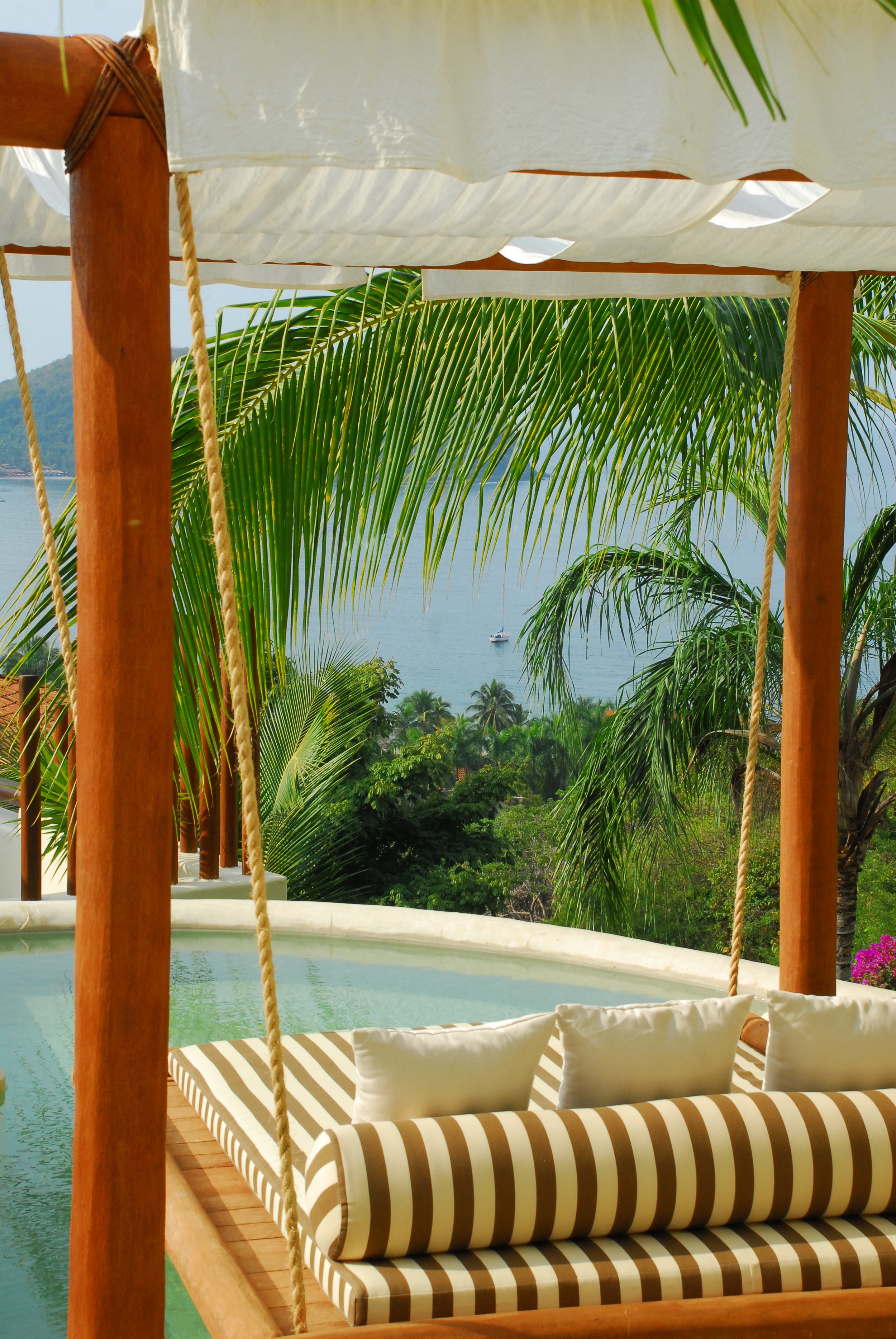cinco-sentidos-hotel-zihuatanejo-mexico-properties-homes-for-sale-hanging-pool-bed.jpg