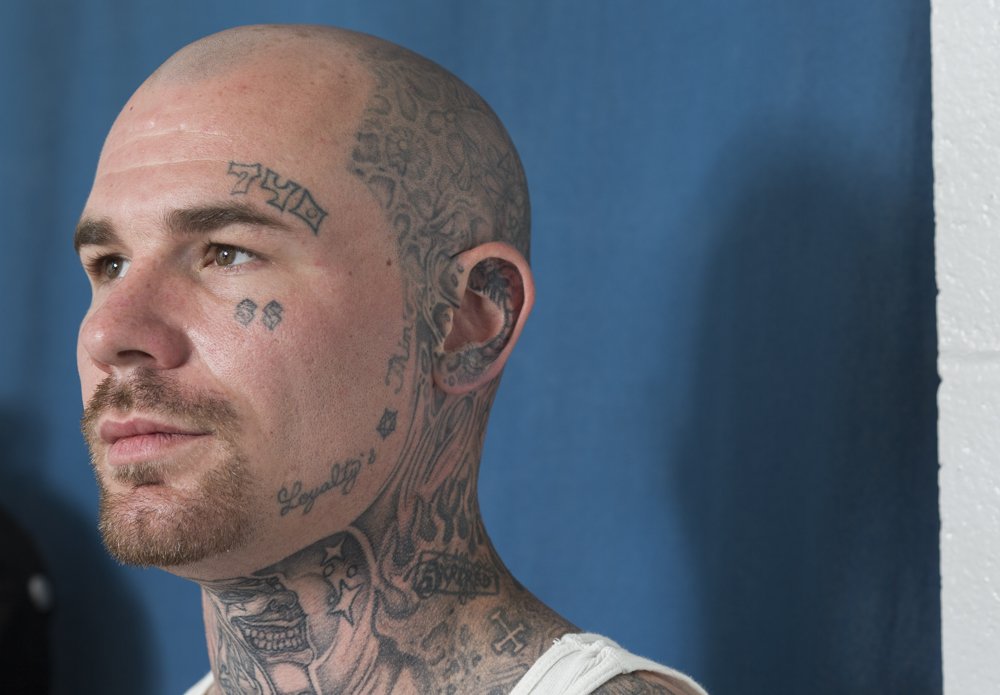  Daniel, a resident at SEPTA Correctional Facility, stands in his room at the correctional facility in Nelsonville, Ohio. SEPTA houses non-violent inmates and offers them programs in an attempt to help them transition back into society. 