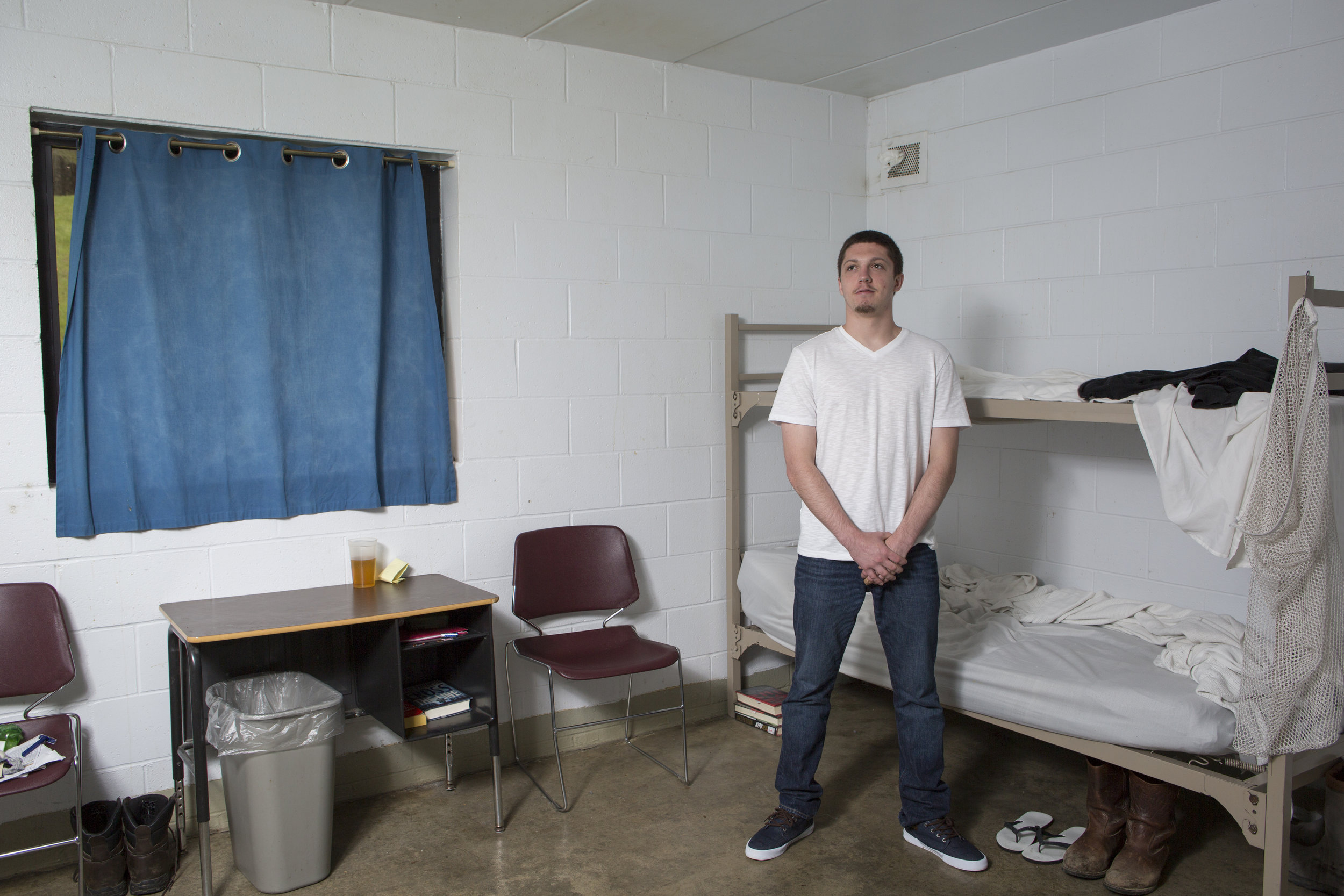  James, a resident at SEPTA Correctional Facility, stands in his room at the correctional facility in Nelsonville, Ohio. SEPTA houses non-violent inmates and offers them programs in an attempt to help them transition back into society. 