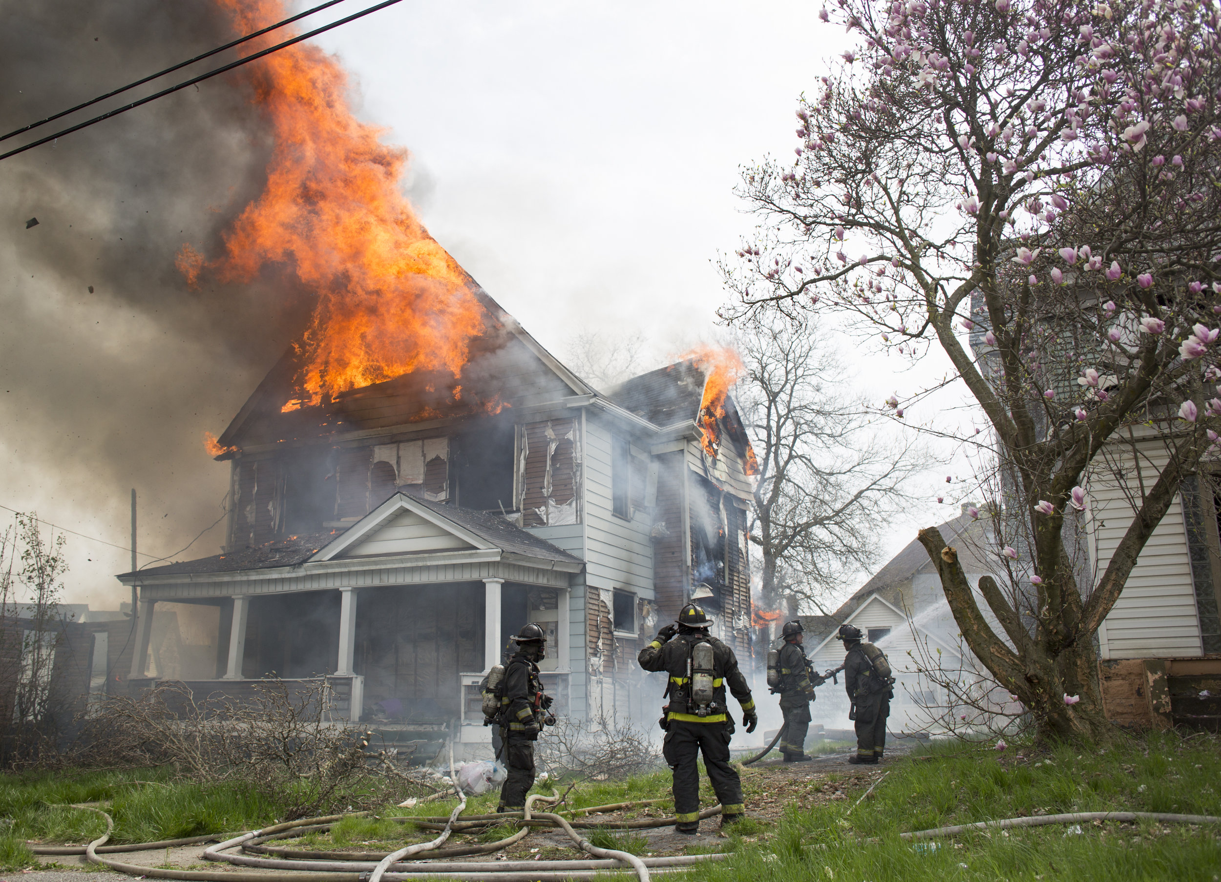  Youngstown firefighters work to put out a vacant house fire on Wilson Avenue on Youngstown's East Side on April 24, 2019. 