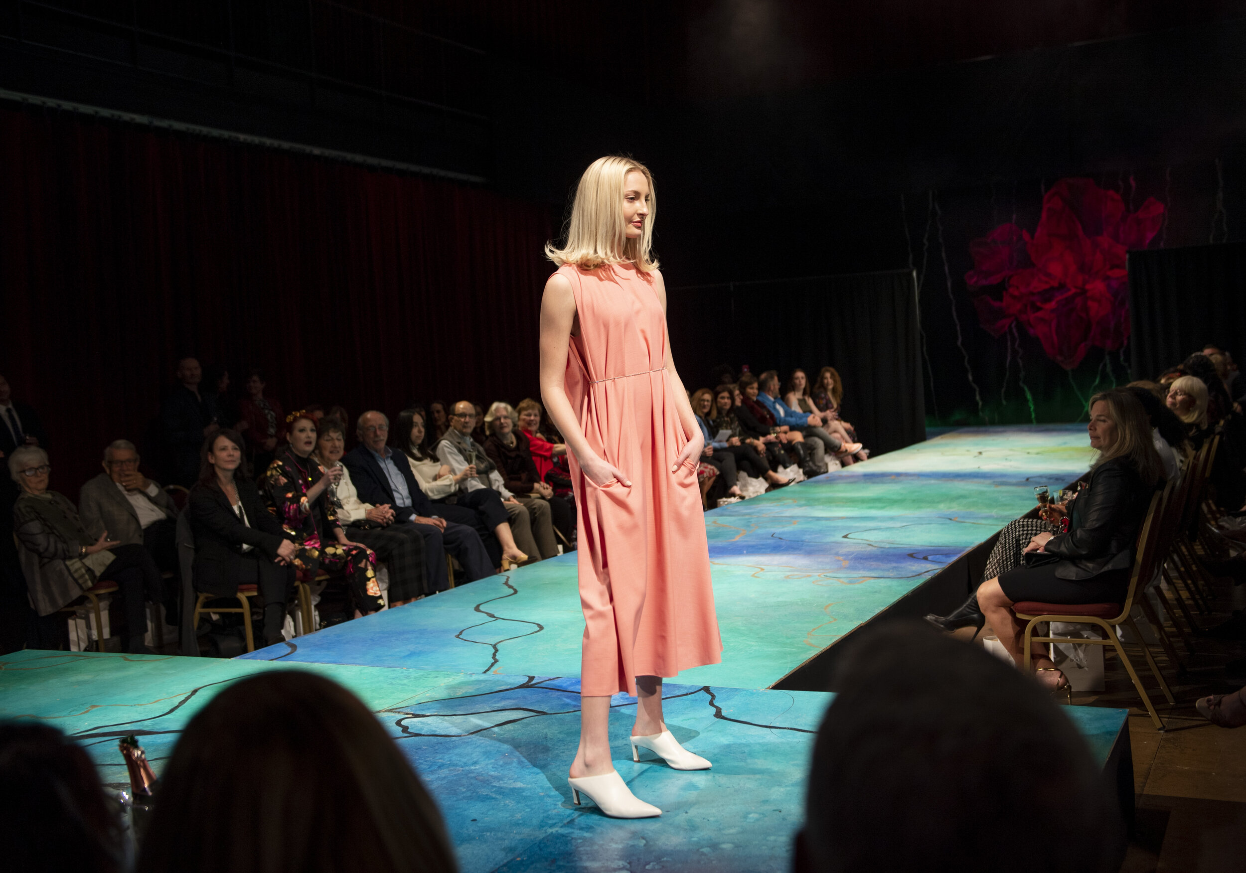  Kayla Best poses on the runway wearing Lela Rose’s Rose Gabardine Cape Back Dress with delicate crystal detail on Monday, March 9, 2020, at Pittsburgh Opera’s Roses and Thorns Fashion Show in the Strip District.  