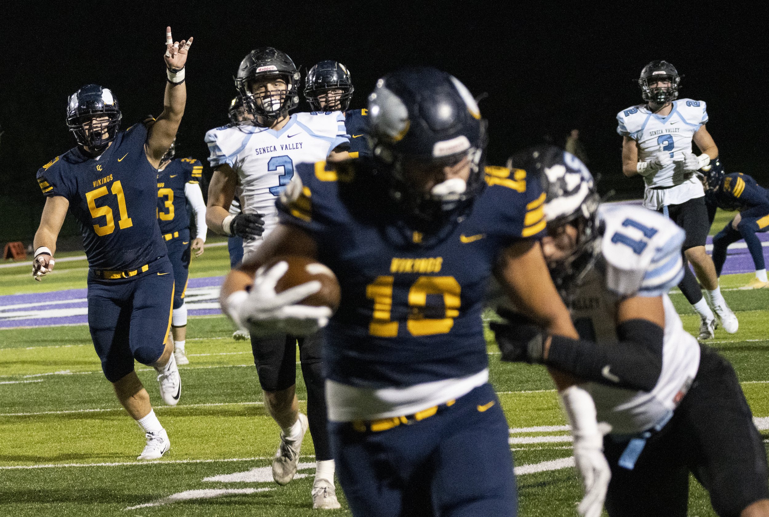  Central Catholic’s Donovan Hinish cheers on his teammate Josh Altsman as he approaches the end zone on Friday, Nov. 12, 2021, at Baldwin High School in Whitehall, Pa. Altsman fumbled the ball, but Hinish recovered it for the touchdown. (Emily Matthe