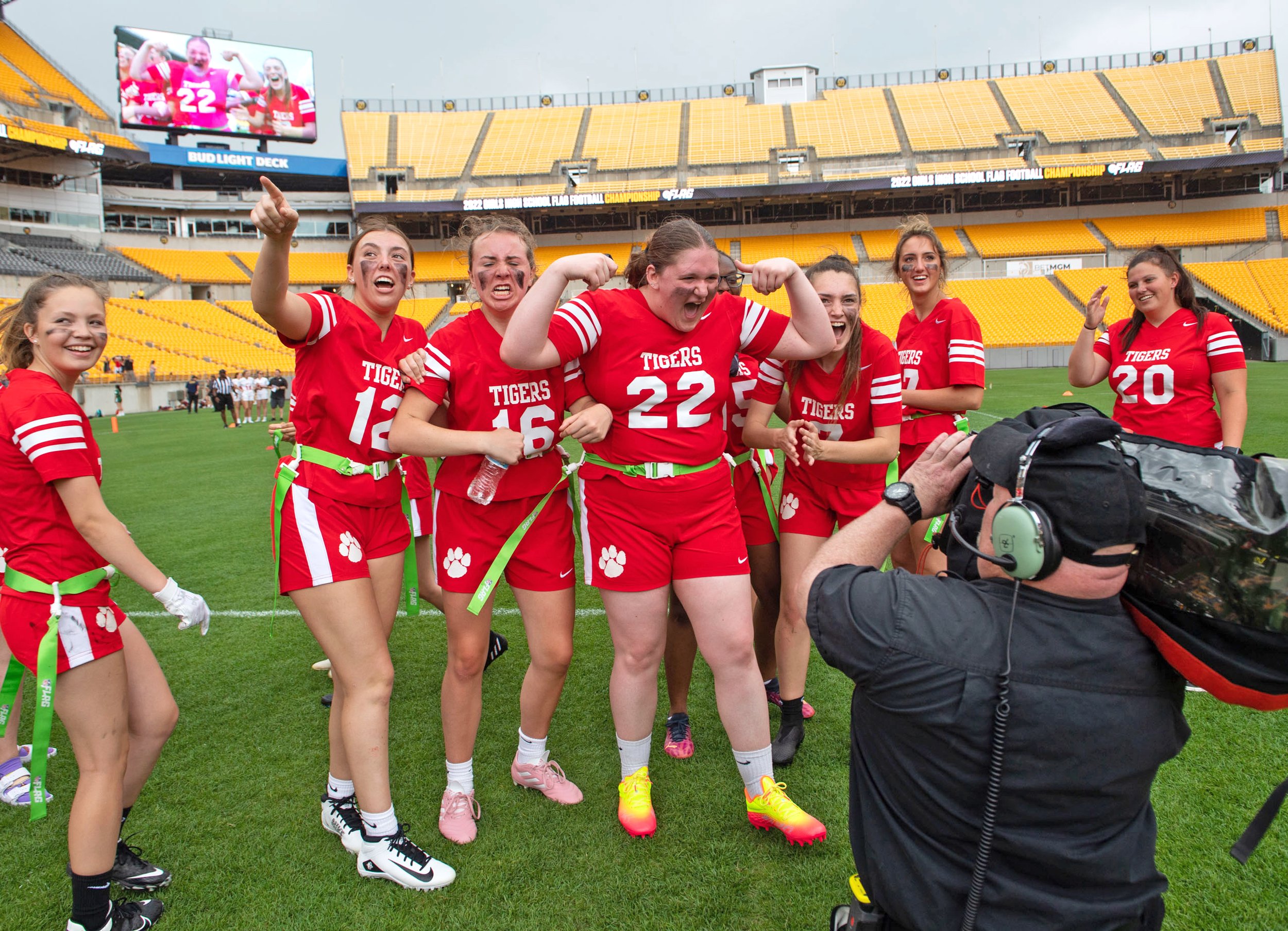  Moon's flag football players react to the camera during the championship game against Shaler on Sunday, May 22, 2022, at Heinz Field on the North Shore. (Emily Matthews/Post-Gazette)  