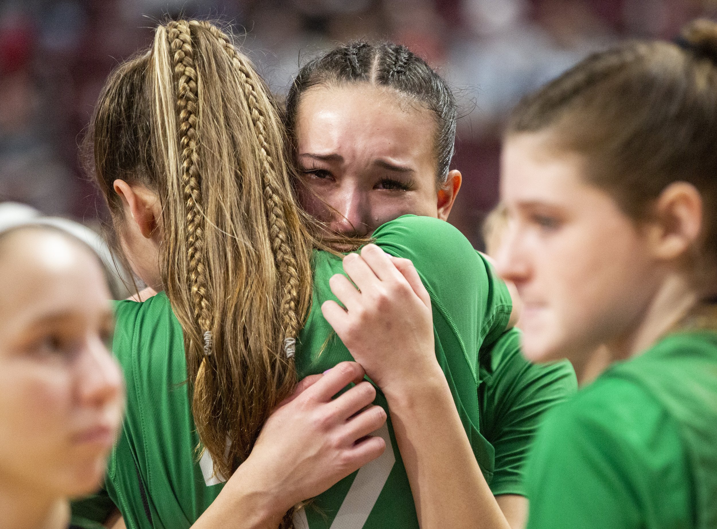 South Fayette's Maddie Webber and Erica Hall embrace after their team's 61-54 loss to Archbishop Wood in the PIAA 5A championship on Saturday, March 25, 2023, at Giant Center in Hershey, Pa. (Emily Matthews/Pittsburgh Union Progress) 