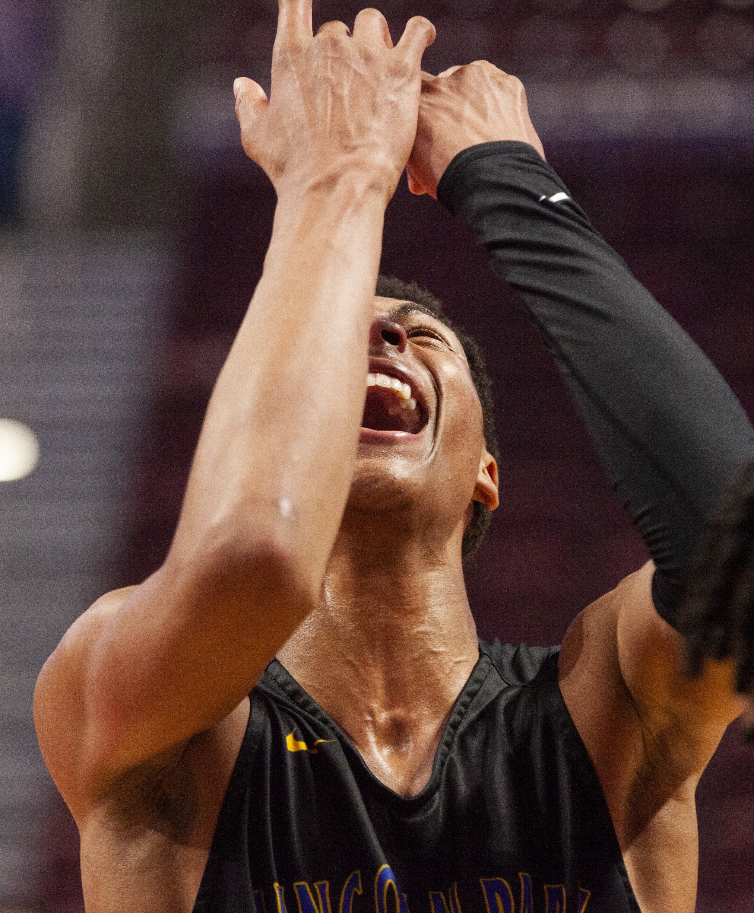  Lincoln Park's Meleek Thomas reacts as he celebrates his team's 62-58 victory against Neumann Goretti in the PIAA 4A championship on Thursday, March 23, 2023, at Giant Center in Hershey. (Emily Matthews/Pittsburgh Union Progress) 