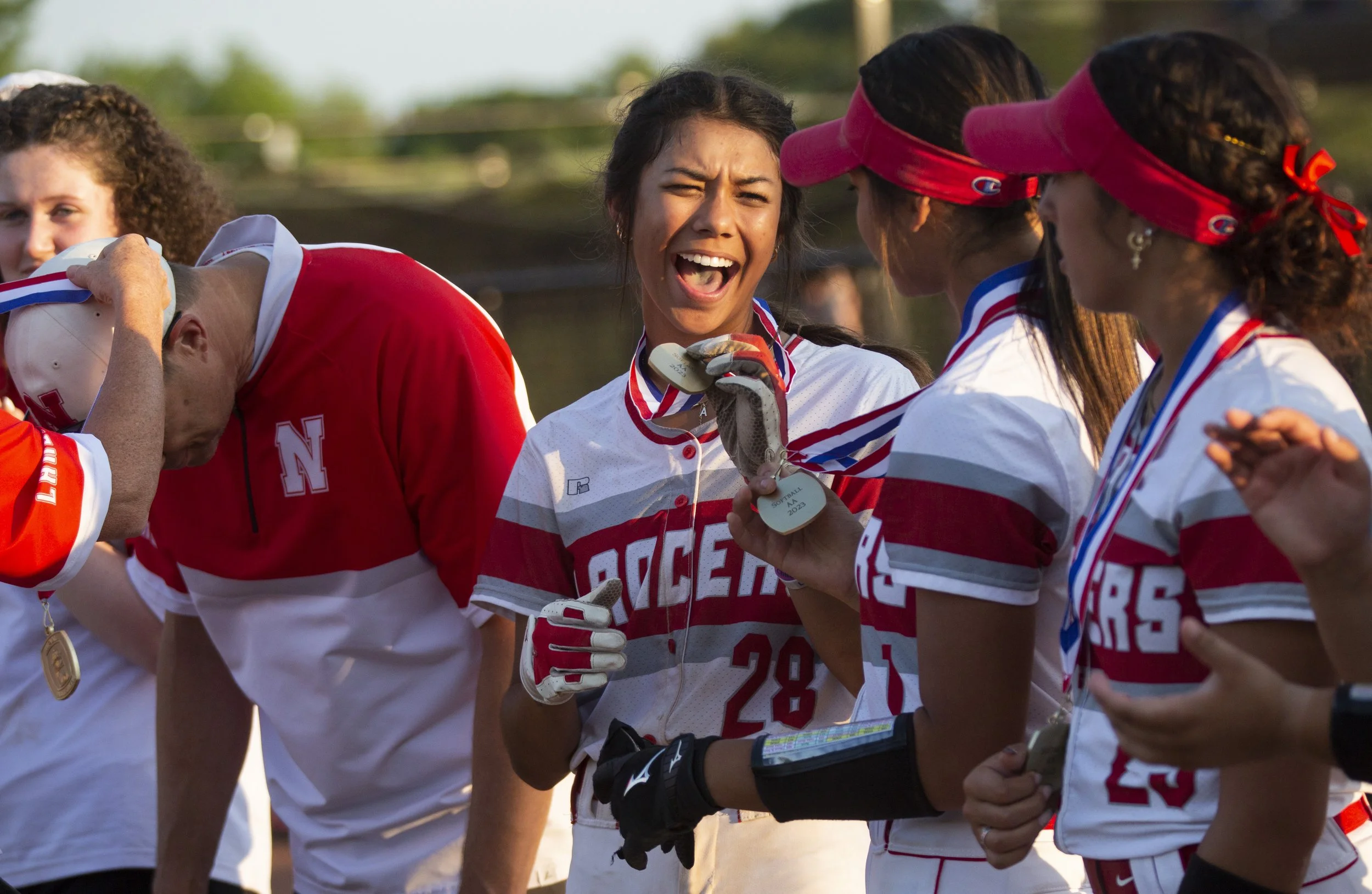 Neshannock's Aaralyn Nogay reacts after receiving her medal after her team's 12-2 victory against Laurel in the 2A WPIAL championship on Thursday, June 1, 2023, at PennWest California's Lilley Field. EMILY MATTHEWS | NEWS 