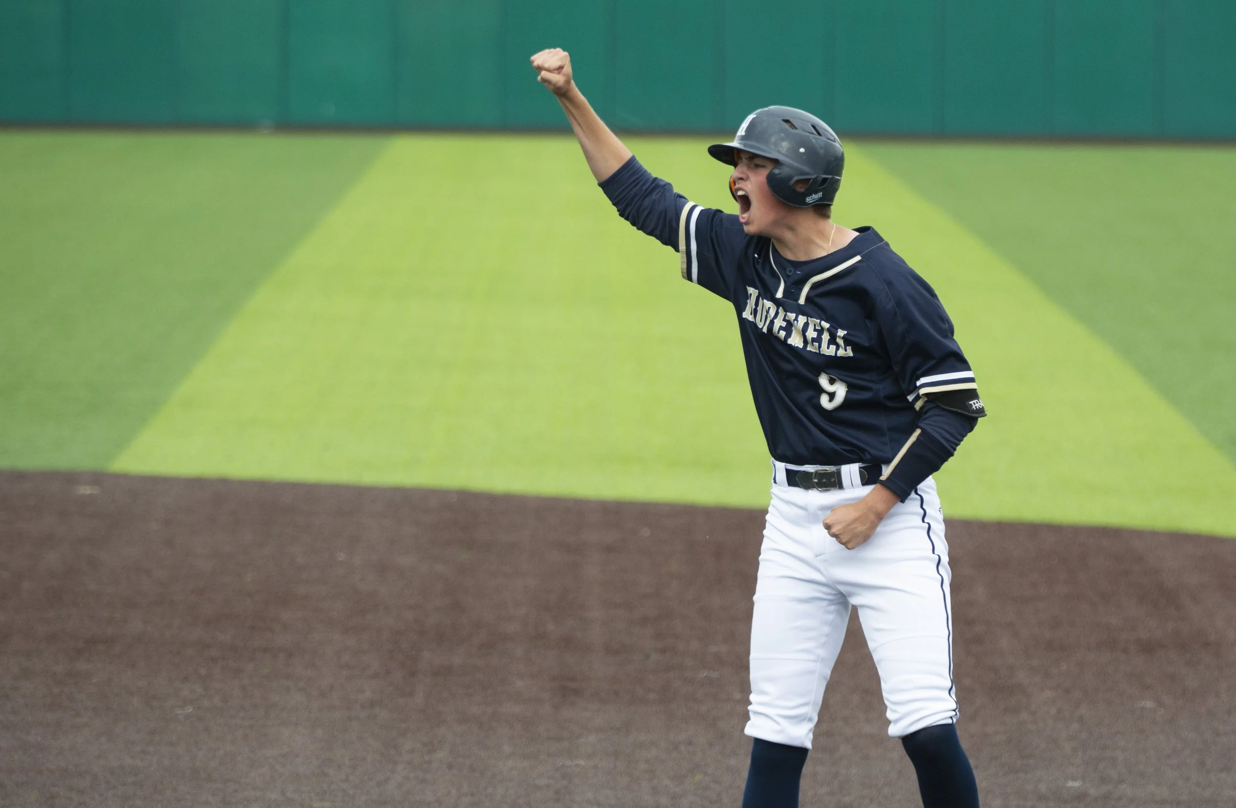  Hopewell's Landon Fox celebrates after hitting an RBI against Cathedral Prep in the PIAA quarterfinals on Thursday, June 8, 2023, at Slippery Rock University's Jack Critchfield Park. Hopewell won 4-2. (Emily Matthews/Pittsburgh Union Progress) 
