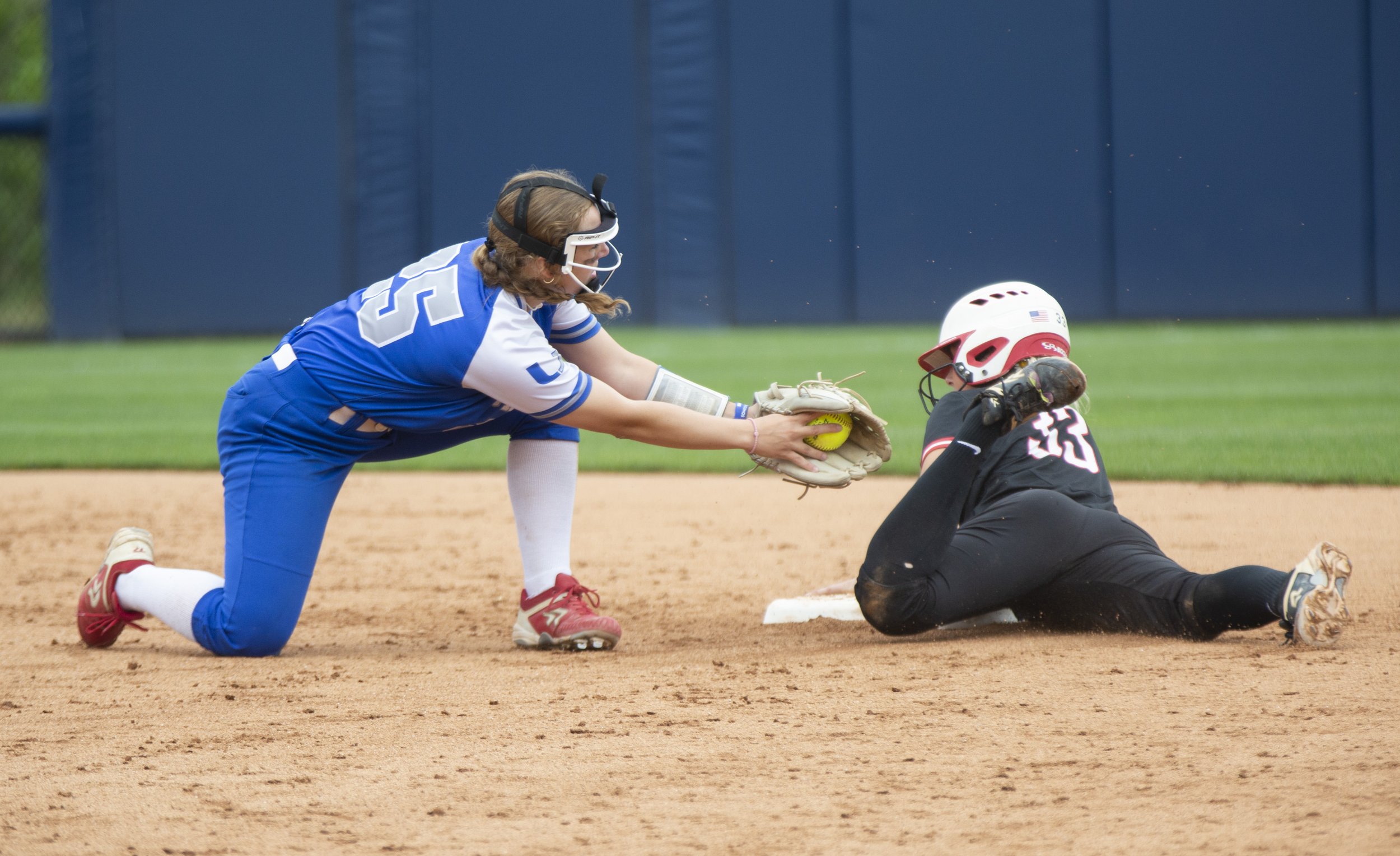 Union's Mallory Gorgacz tries to tag Tri-Valley's Cassidey Snyder in the PIAA 1A softball championship game on Friday, June 16, 2023, at Penn State's Beard Field. Snyder was called safe. (Emily Matthews/Pittsburgh Union Progress) 