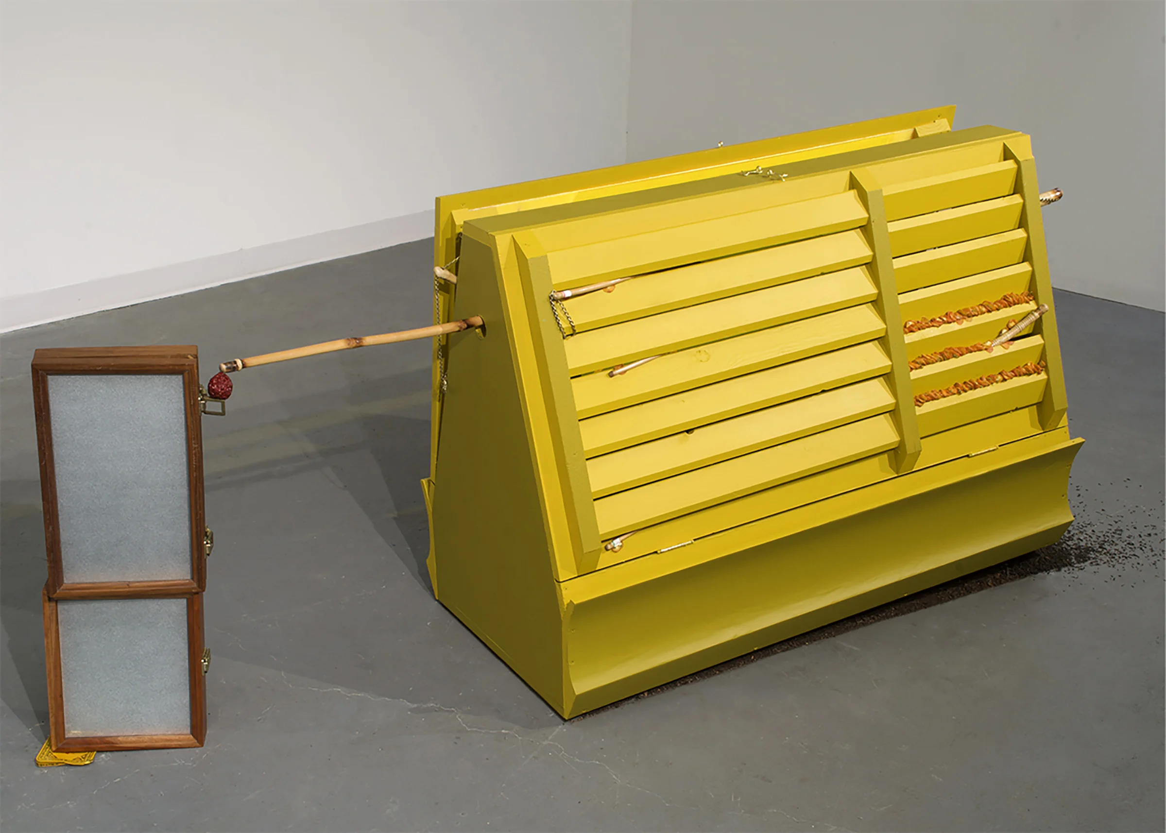 Fortunella , 2019, reclaimed lumber, neon plexiglass, kumquats, bamboo walking sticks, jasmine tea, jujube, window privacy film, tea tin lid, house paint, brass hardware, 34 x 100 x 26 inches