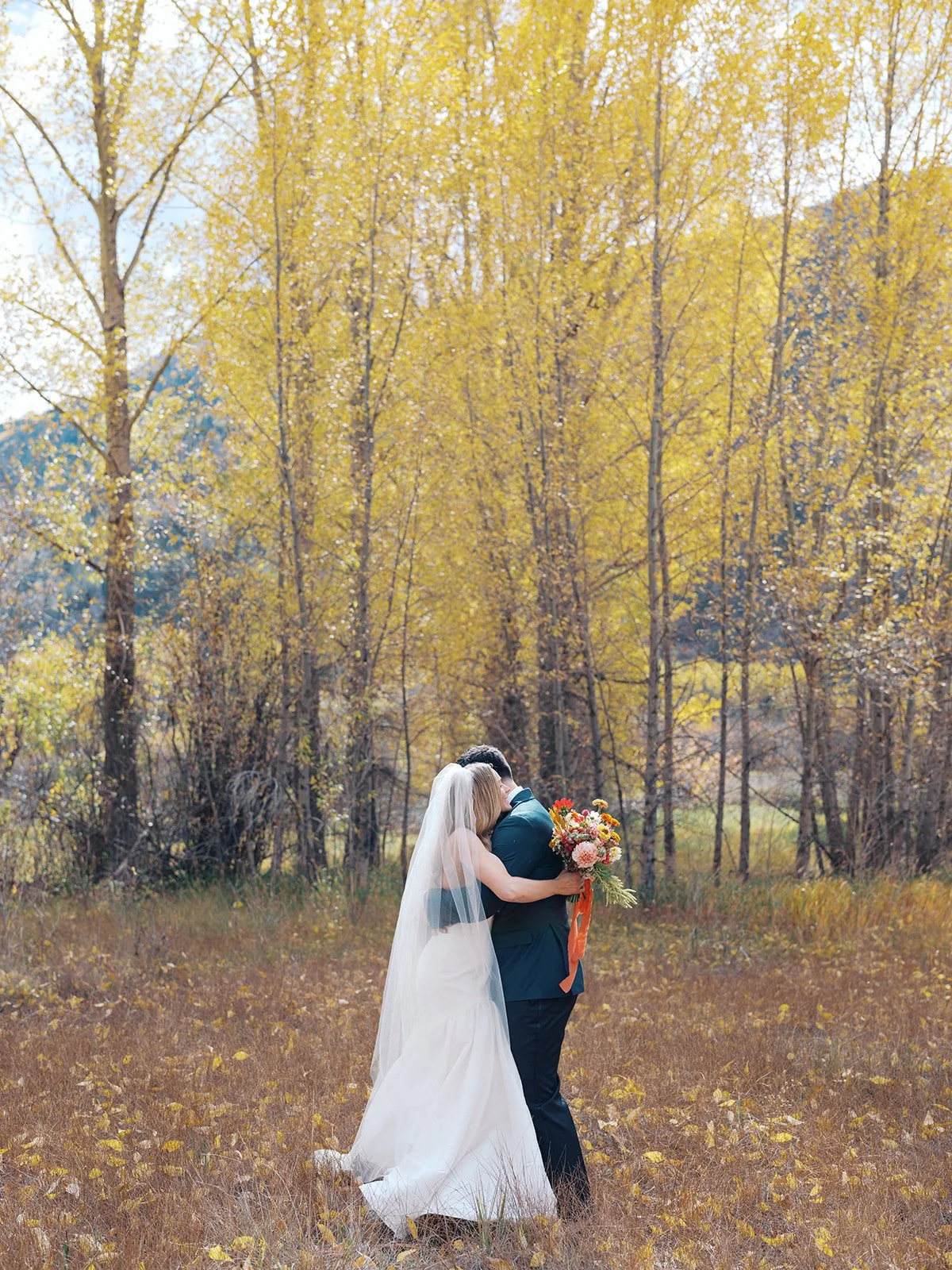 Bride and groom during their fall wedding in Aspen