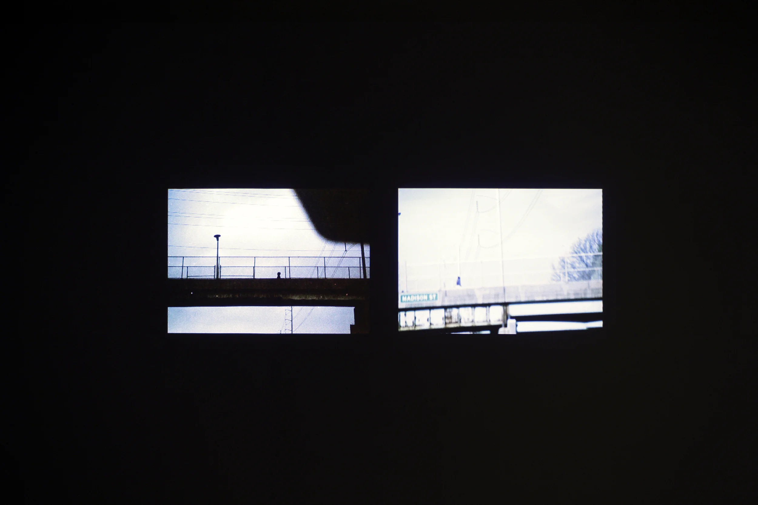 Installation view, Unemployed, 2005-2015, slideshow on single channel projection