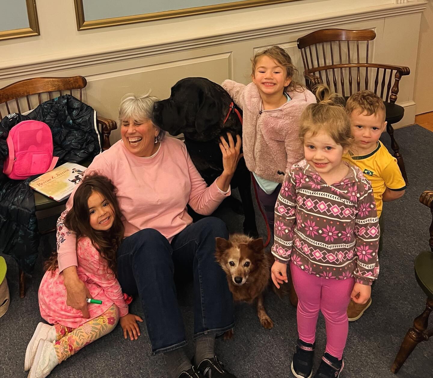 Keeper and Max had a wonderful visit during story time today at the Randall library visiting with the kids as they read stories about therapy dogs! The children loved the dogs and Keeper showed off her tricks : ) And Kris loved her kiss from Max 😘 #