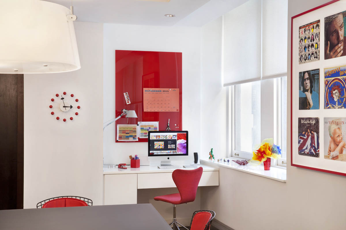 Red accents and very special rock vinyl art punctuate the kitchen. The inspiration for another blog post .