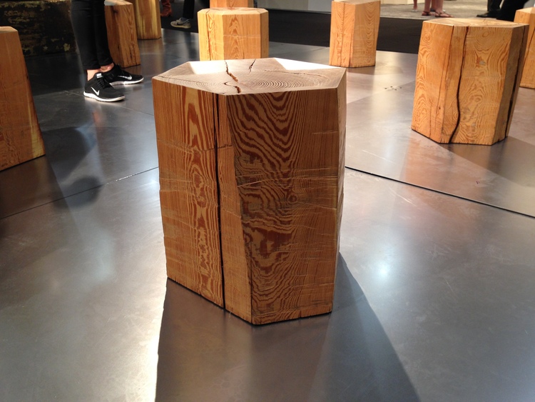 Uhuru Designs contrasts the organic lines from reclaimed beams with precision-cutting