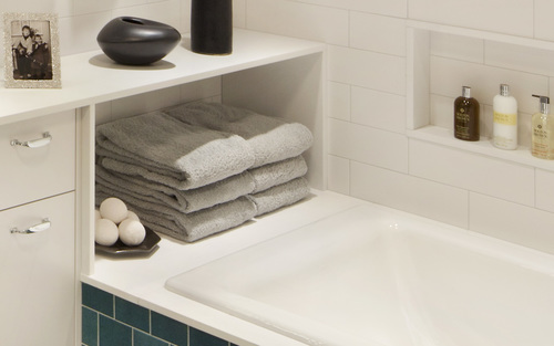 A continuous counter-top and carved out niches
