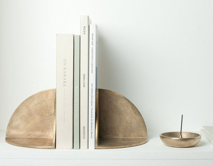 Brass or textural ceramic? Bookends available at The Future Perfect