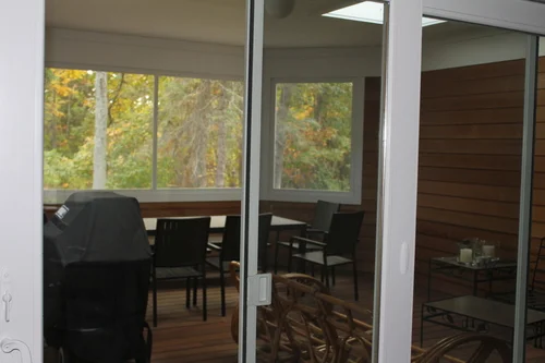 Our underused screened porch.&nbsp; (Shown in the off-season as a storage area)