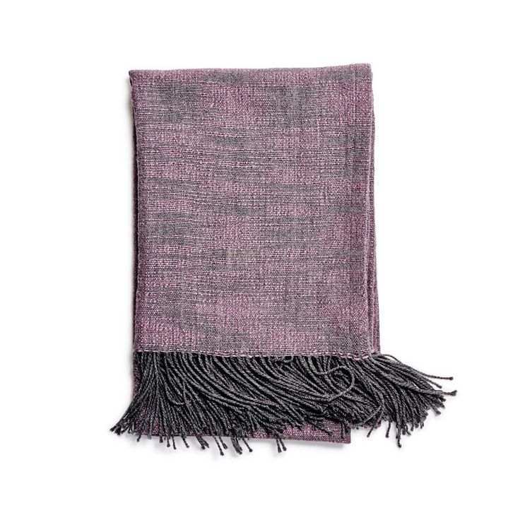 Also made in Peru, the Noe throw from Sefte is woven from two hues of organic alpaca to imitate linen. via abchome.com