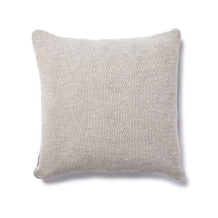 The knitted Kimsa pillow from Sefte resembles faux bois. via abchome.com