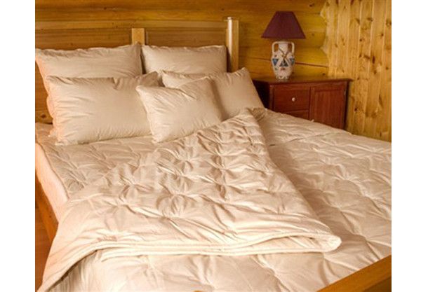 Comforter filled with organic alpaca is winter weight cozy. via satarahome.com