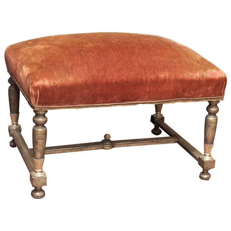 A vintage ottoman, with original alpaca upholstery. via 1stdibs.com