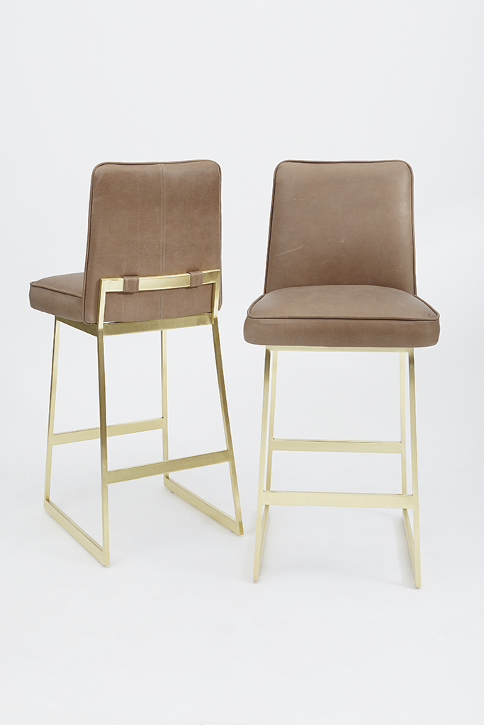 A lovely and welcoming combination of leather and brass. via Lawson Fenning .