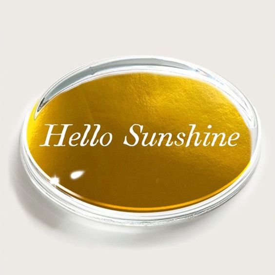 Paper weights can be hum drum and serious, but this one would make me happy everyday! Hello Sunshine from the Museum of Art and Design .