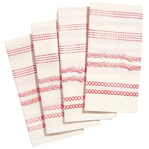 Cloth napkins are perfectly functional. Pink embroidered napkins are perfectly frivolous. John Robshaw, via Gracious Home.