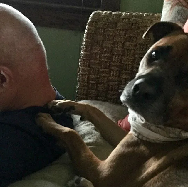Holdin’ on to daddy as the storm goes through.