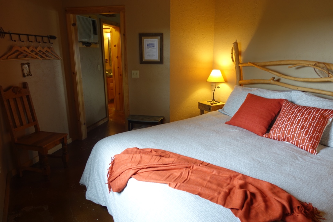 Master Bedroom with king sized bed and custom headboard