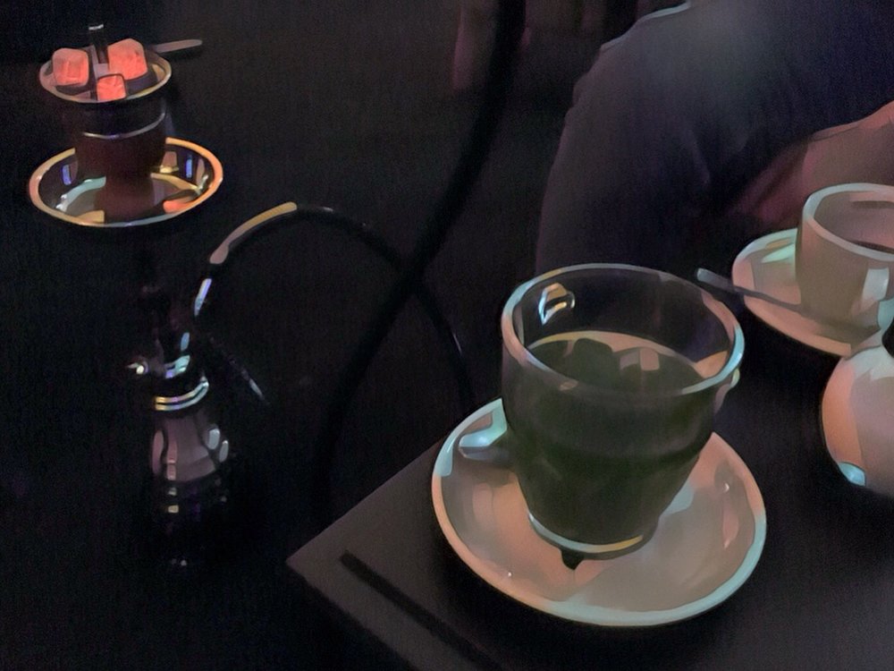  Our fresh mint tea and coffee were a nice pairing with the mild apple flavor of the Shisha. 