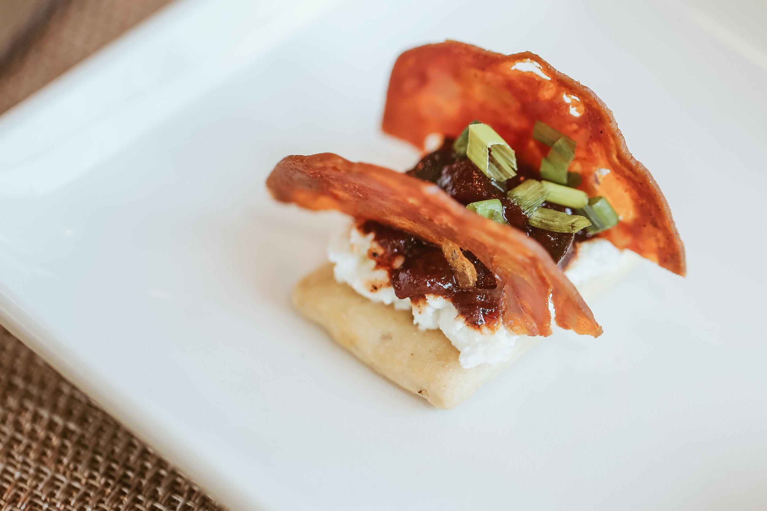 Extra Brut Food Pairing: Salt & Pepper Crostini with Crispy Chorizo, Fresh Chevre and Ancho Chili Jam