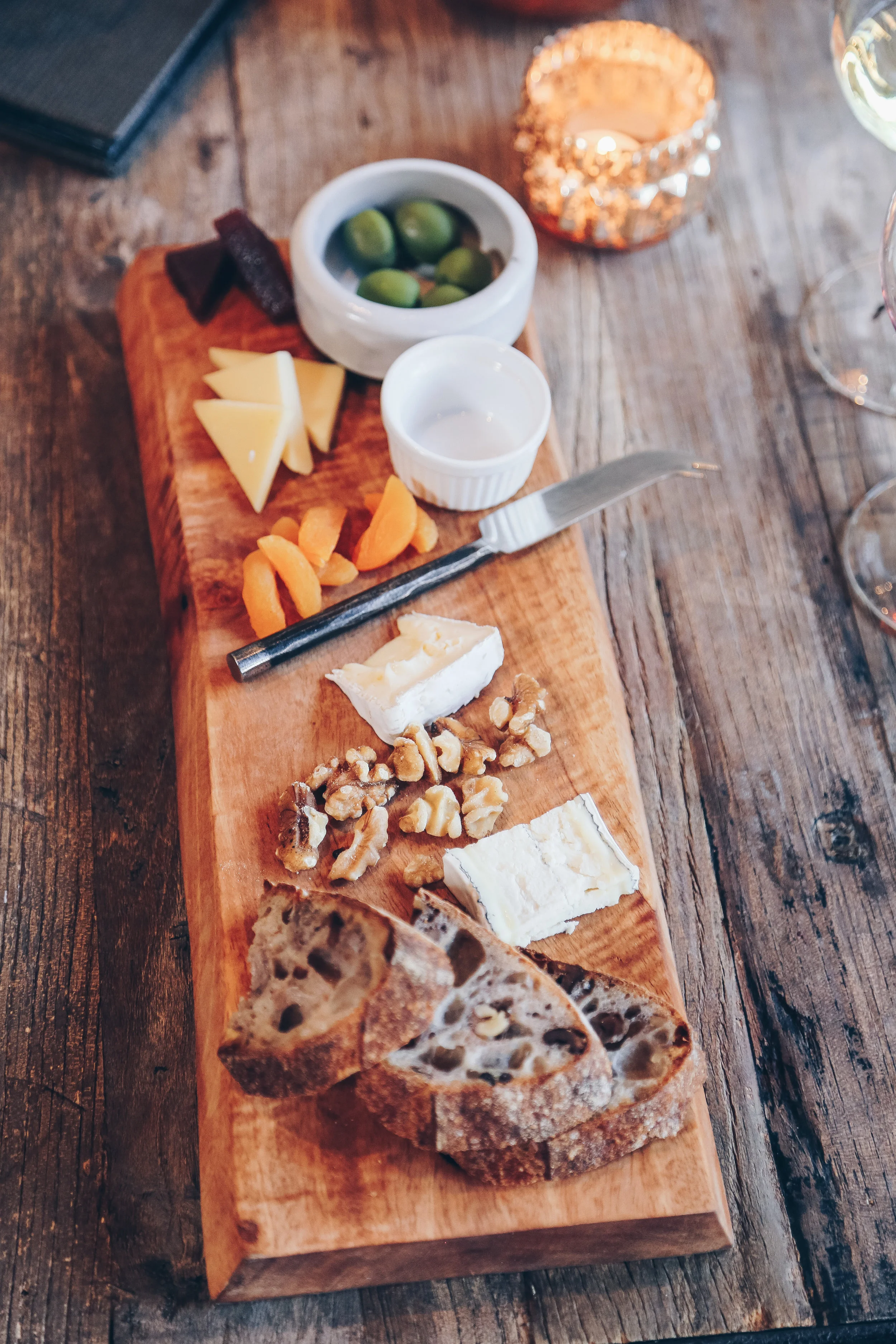 Burgondy & Cheese Flight - Cowgirl Creamery Mt. Tam, Cypress Grove Humboldt Fog & Central Coast Creamery Bishop’s Peak, Dried Apricots, Local Walnuts, Castelvetrano Olives, Membrillo, Model Bakery Walnut Bread Wine Pairings- 2014 Chardonnay | 2014 Pinot Noir, Charles Vineyard* | 2014 Pinot Noir