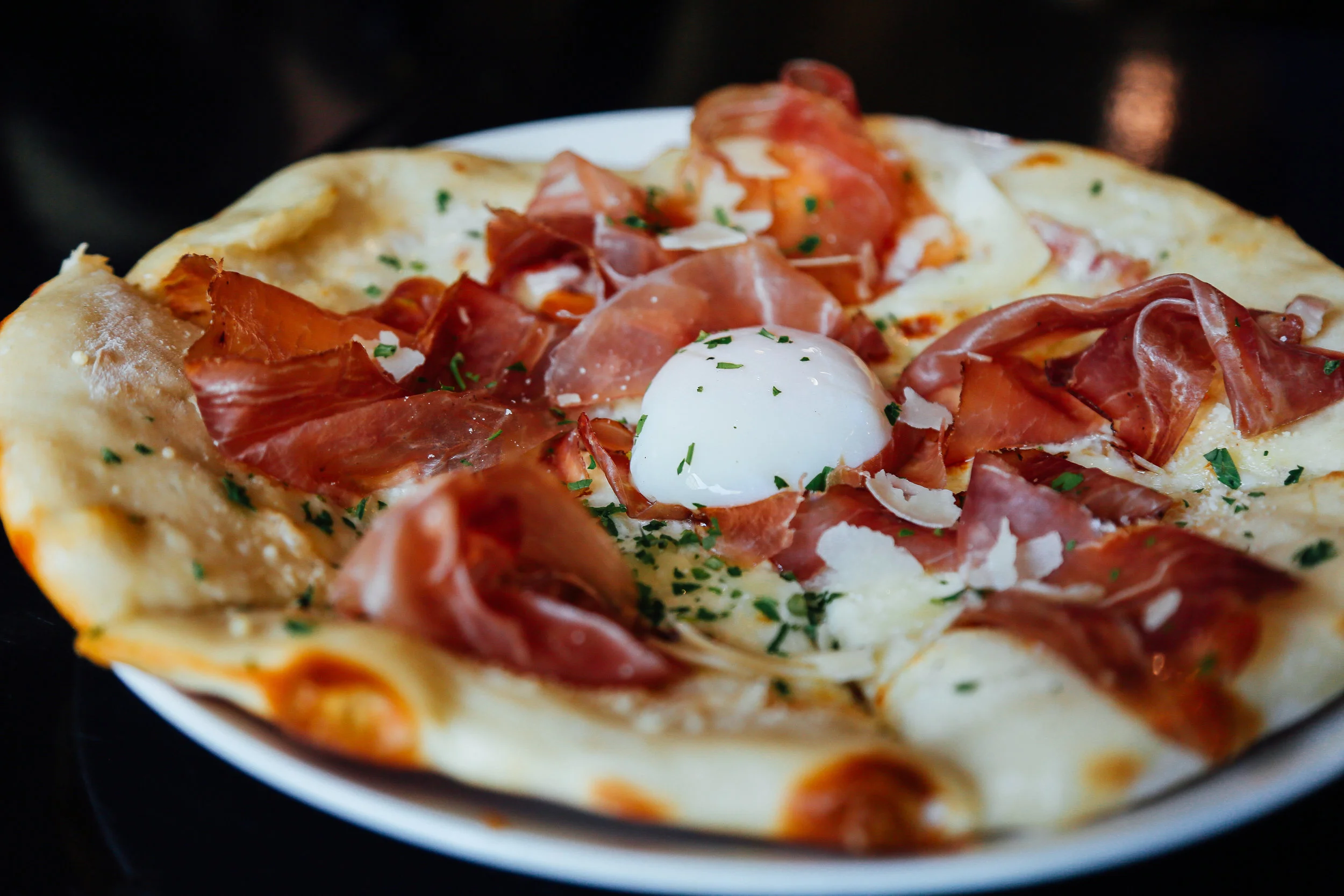 Breakfast Pizza - speck, pancetta cream, parsley, 63 degree egg, shaved parmesan
