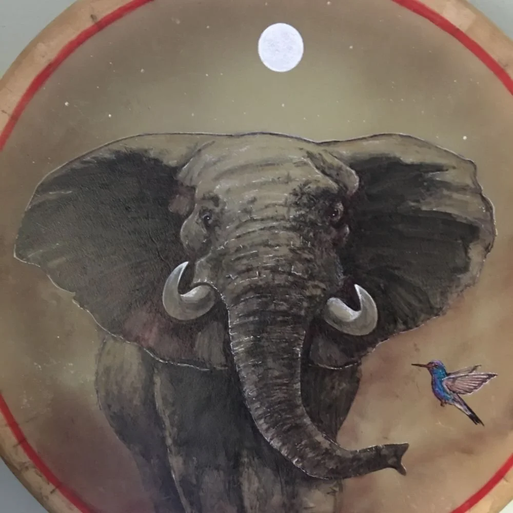Elephant shamanic drum by David Craig, an elephant and a hummingbird beneath a full moon