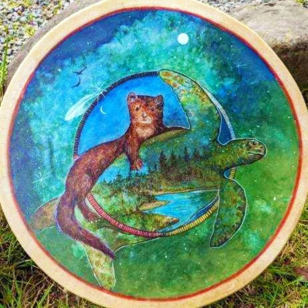 Turtle medicine drum by David Craig, an otter riding a turtle over a green forest landscape