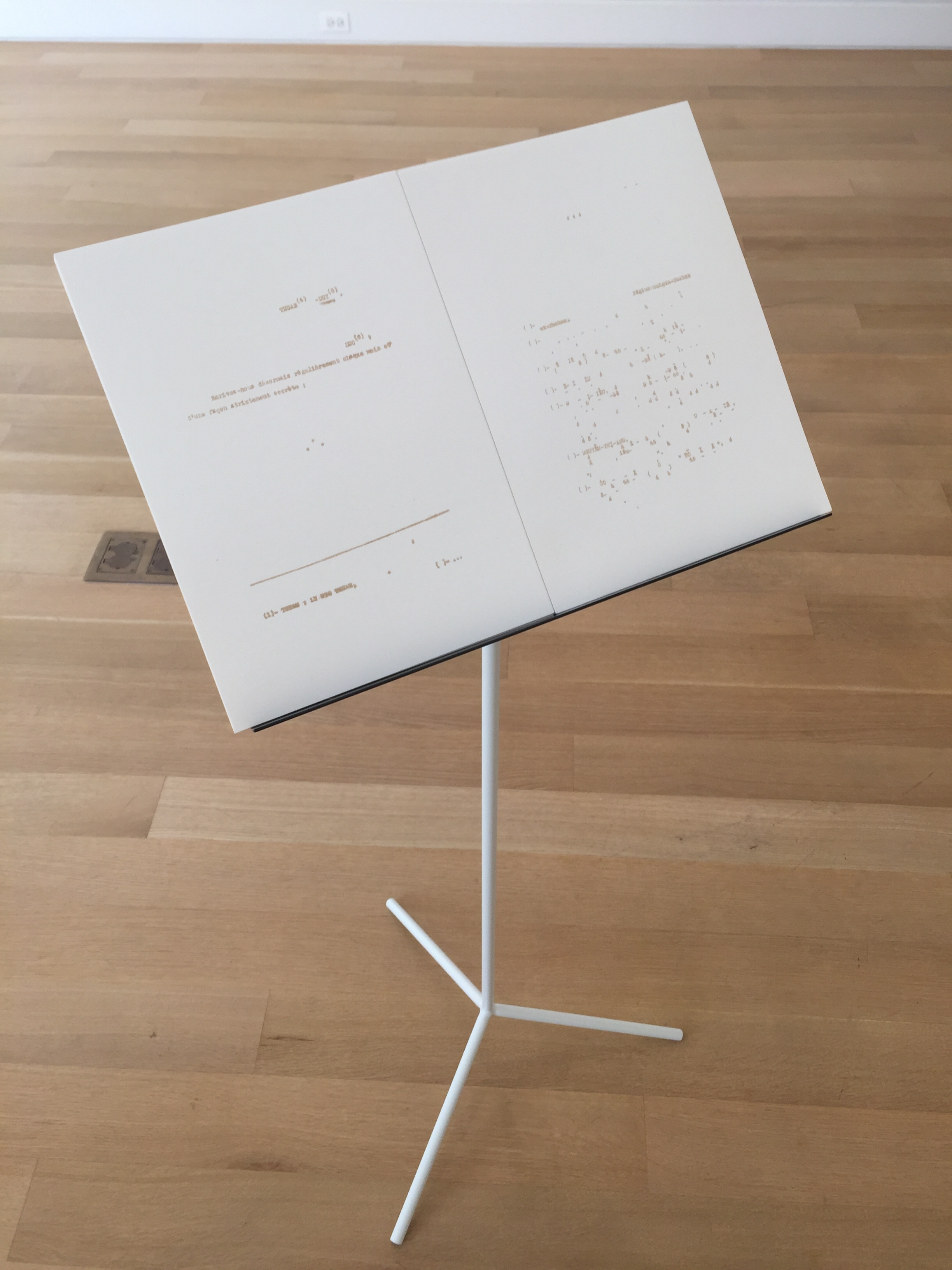   To Say Her Name  Music stand, accordian-bound book of laser cut performance scores 50 x 19 x 19 in 2017 
