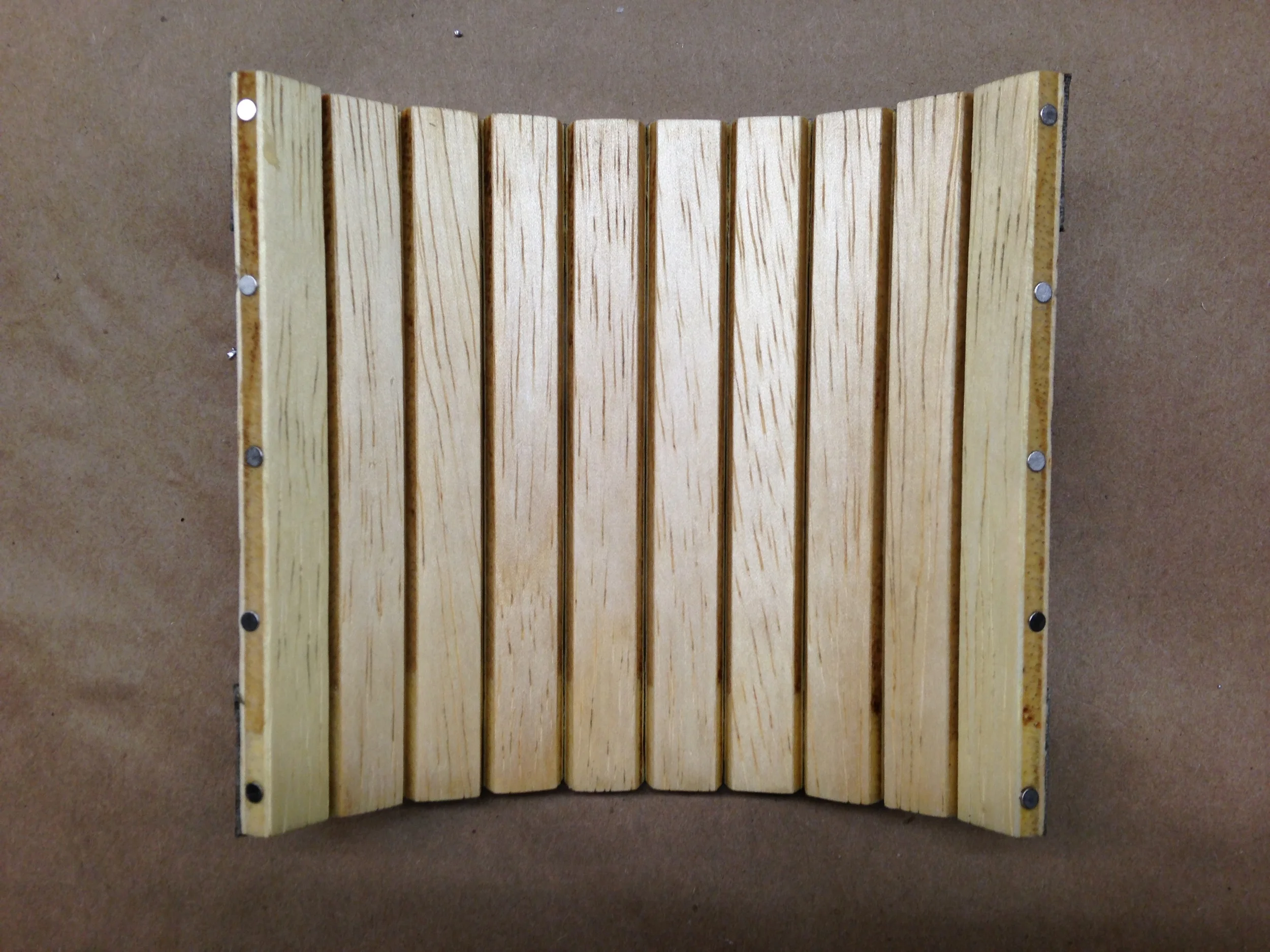 10 mini magnets form latch mechanism
