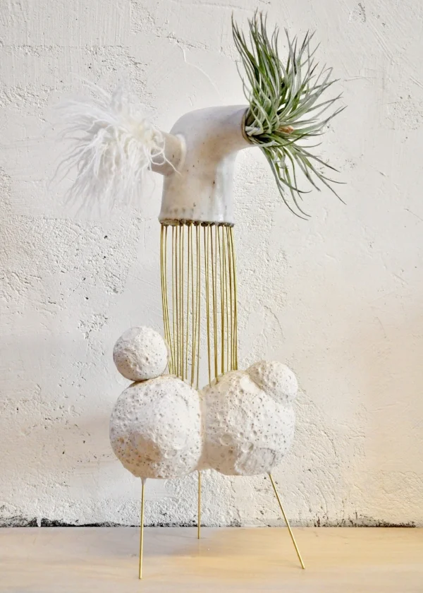 MM0001 Ceramic and mixed media . 21" x 8" x 7" $2000. Spray plant with water twice per week. SOLD