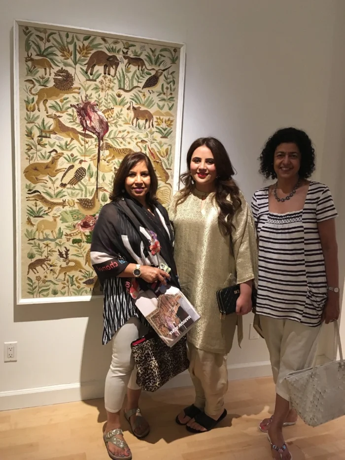 Marium Agha, center, at her exhibit at Artifact Gallery in New York City