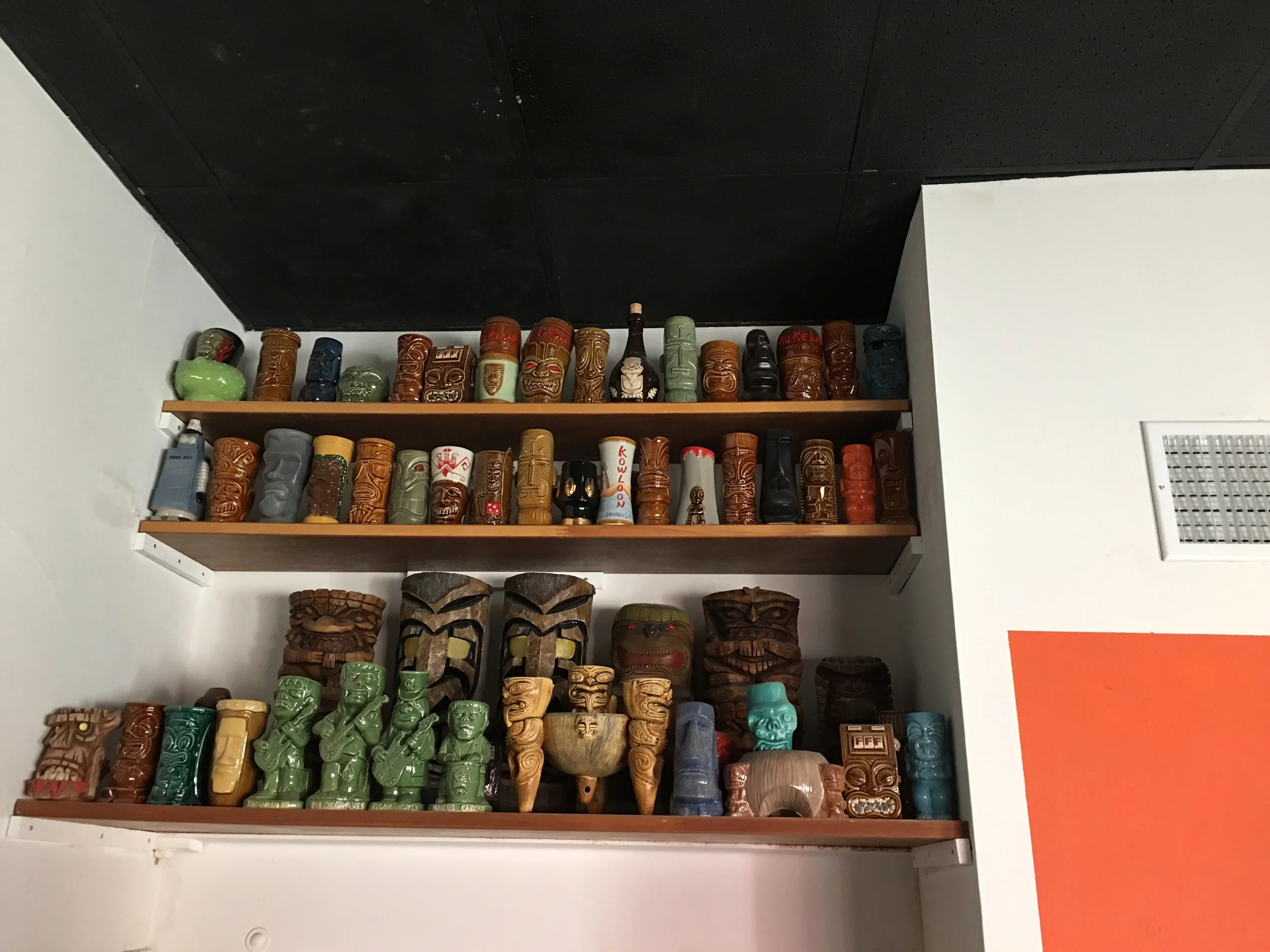 One of several displays of Marty's tiki glass collection
