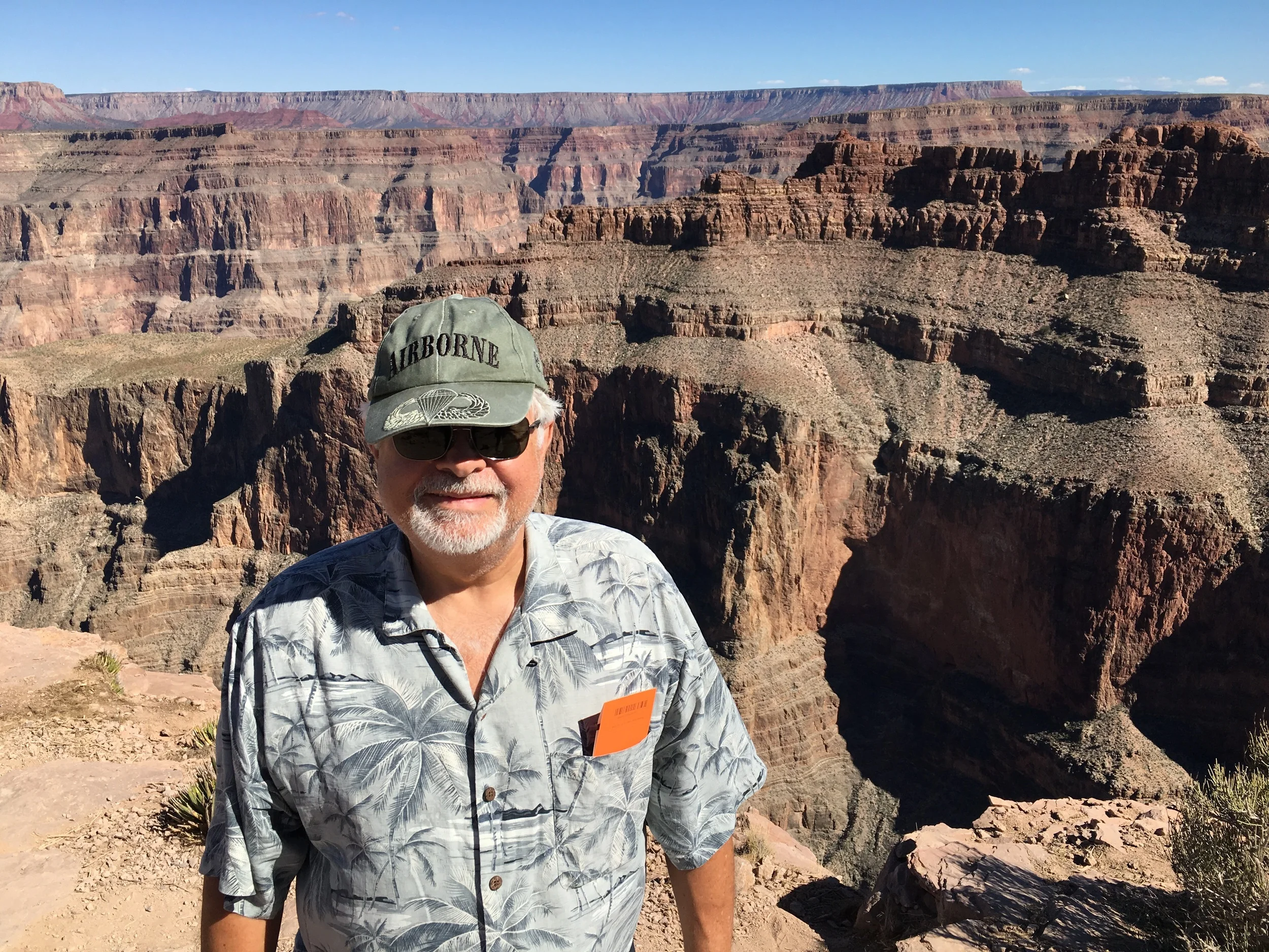 Russ near the edge; we walked the glass skywalk but they would not allow phones or cameras! It was very scary; but truly a once in a lifetime experience.