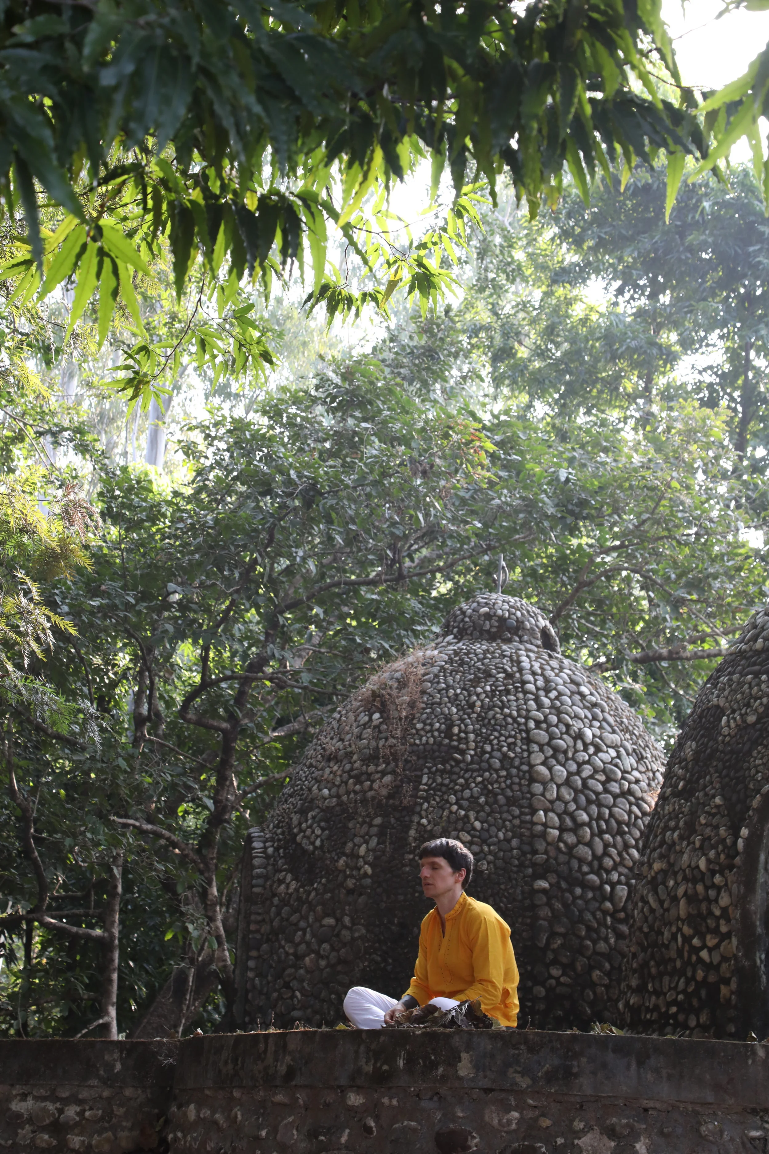 Sitting at the meditation huts at the Beatle's ashram 3